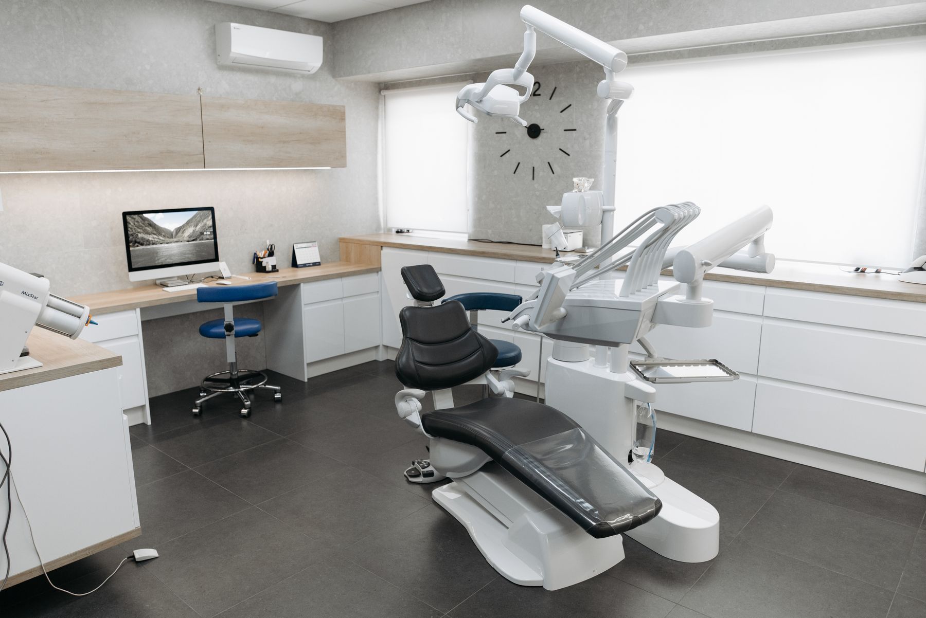 Carefully maintained dental operatory with bright natural light